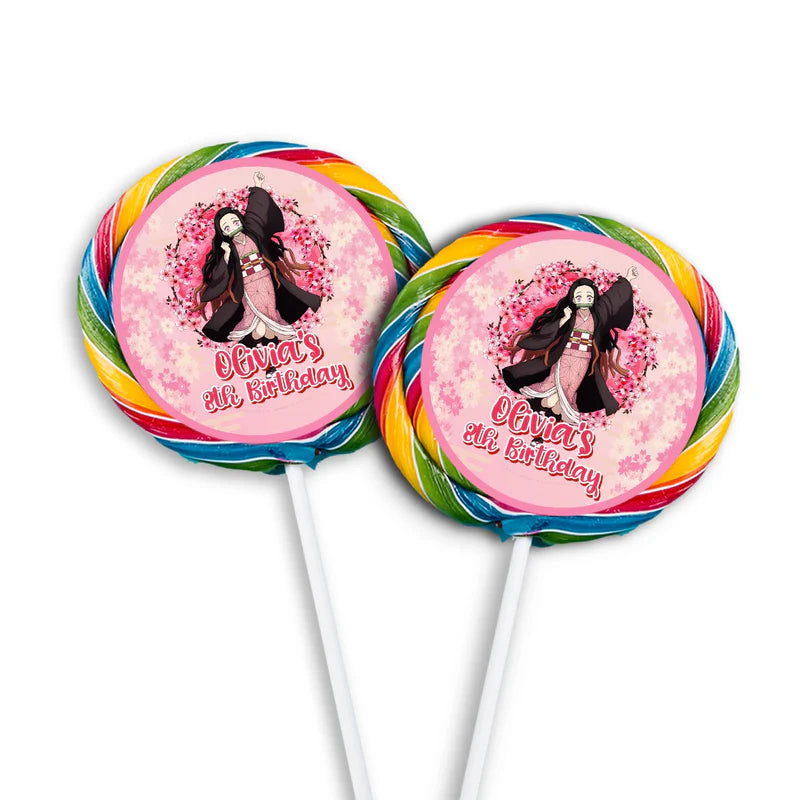 Demon Slayer Nezuko lollipop label mockup showing round stickers attached to pink cellophane wrapped suckers