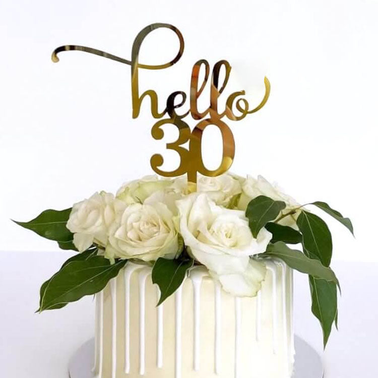 Gold acrylic cake topper with the text 'Hello 30,' perfect for 30th birthday celebrations.