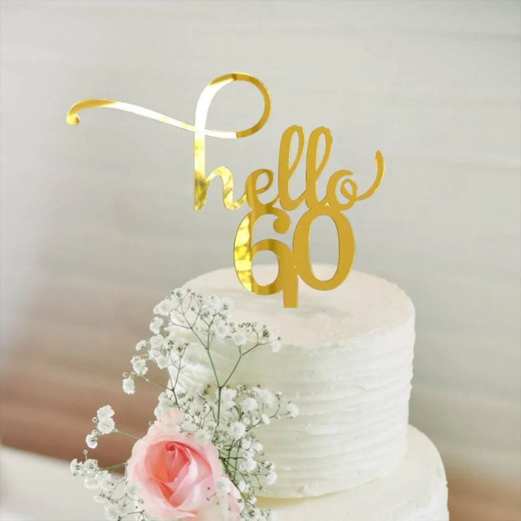 Gold acrylic cake topper with the text 'Hello 60,' perfect for 60th birthday celebrations.