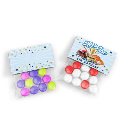 All Star Sports treat bag topper label folded over clear cellophane party favors filled with multi-colored candies.