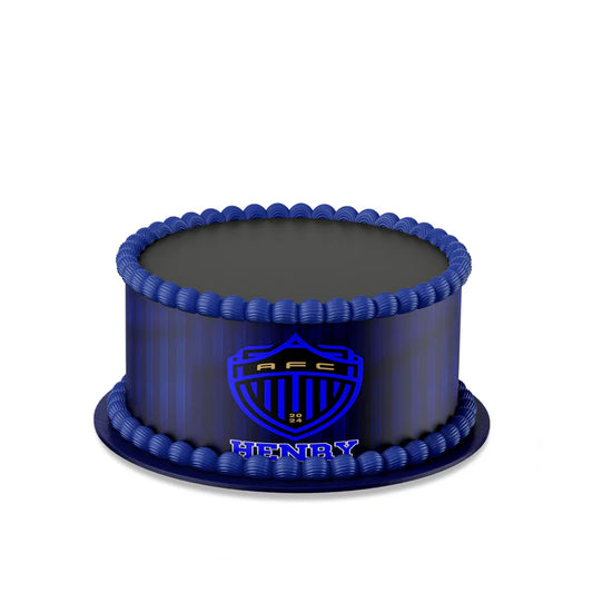 Auckland FC edible cake strips with green blue stripe wrap on frosted cake flat lay