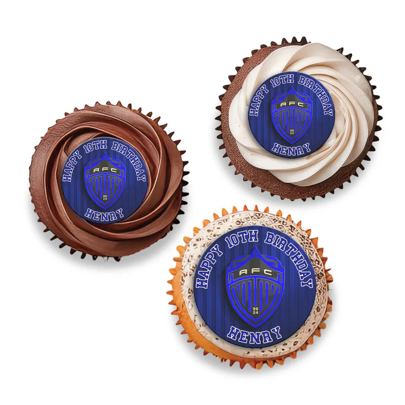 Auckland FC cupcake toppers with green and blue soccer theme placed on frosted cupcakes