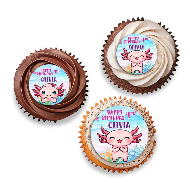 Axolotl cupcake toppers with round pastel designs featuring axolotls and underwater theme, flat lay on white surface