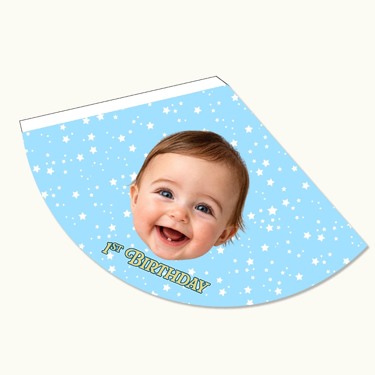 Close-up of a personalised baby blue children's party hat showing high-quality cardstock text and face photo layout.