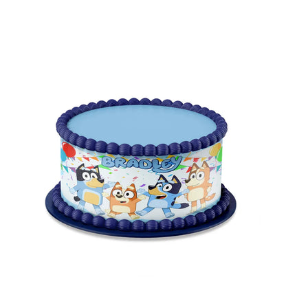 Bluey edible cake strips with custom name design in vibrant colors on cake edge flat lay