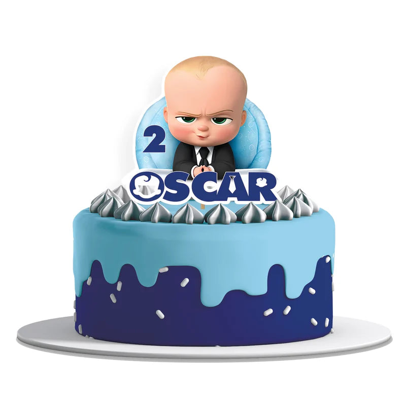 The Boss Baby cake toppers featuring cut-out characters and custom name in cardstock flat lay on white background