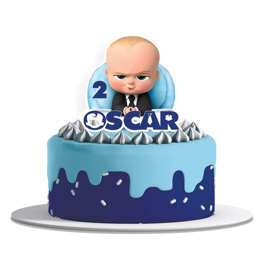 The Boss Baby cake toppers featuring cut-out characters and custom name in cardstock flat lay on white background