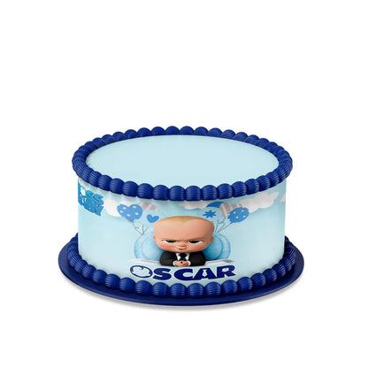 The Boss Baby edible cake strips in blue and gold theme on icing sheets shown rolled and flat on white surface