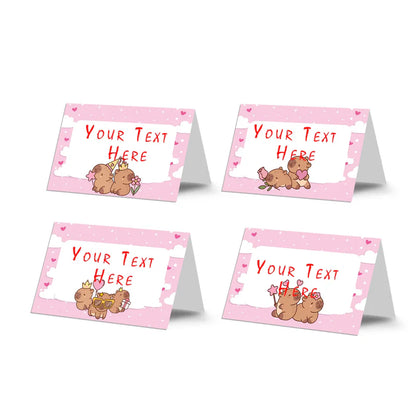 Capybara food cards featuring custom text on folded brown and green themed buffet tent labels flat lay