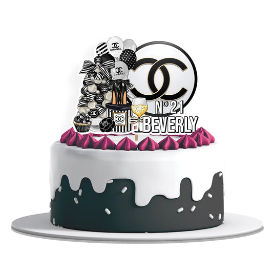 Chanel inspired personalized cake toppers with chic black and gold design displayed on white background