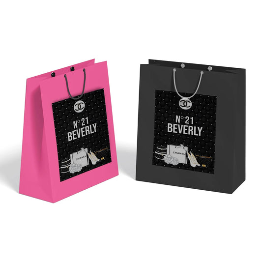 Chanel inspired goodie bag label with minimalist black and white luxury theme shown flat lay
