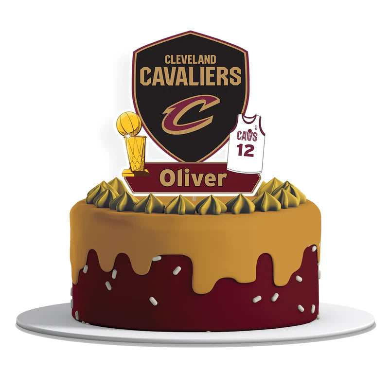 Cleveland Cavaliers cake toppers with personalized name in red and gold on thick cardstock, flat lay