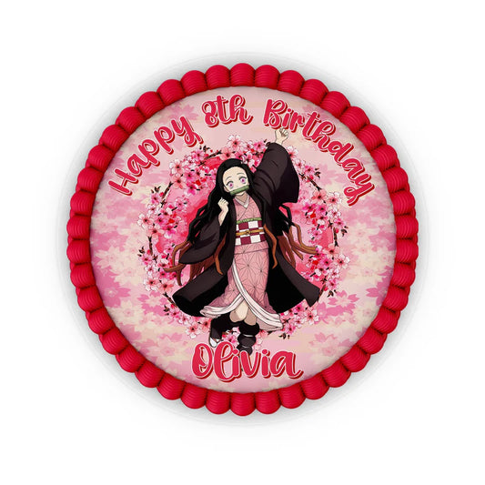 Demon Slayer Nezuko edible icing cake image with a pink background displayed on a round frosted cake