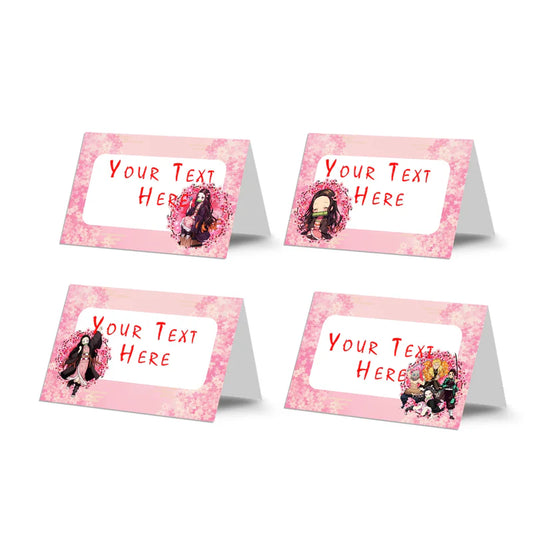 Demon Slayer Nezuko food cards showing tented buffet labels with pink anime graphics on a wooden surface