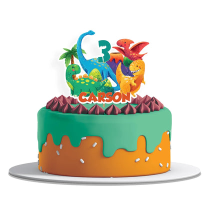 Personalized cake topper featuring colorful dinosaur designs and custom name 