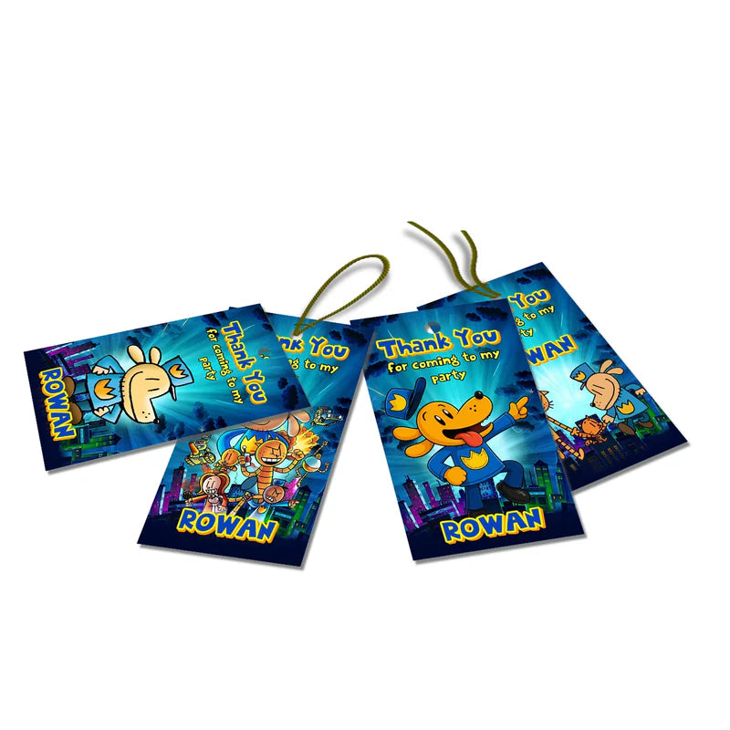 Dog Man thank you tags with colorful text accents displayed on a neatly wrapped party favor box