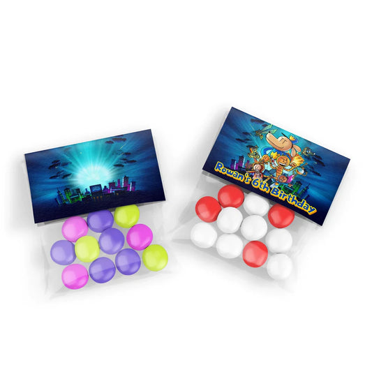 Dog Man treat bag topper label showing a colorful folded paper design sealing a clear candy pouch