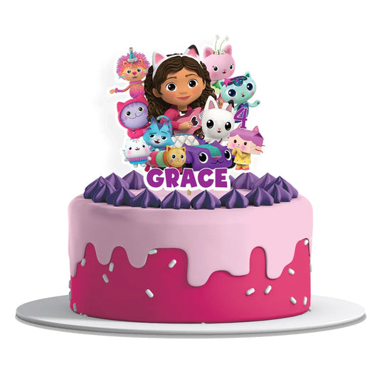 Gabbys Dollhouse cake toppers personalized with name in bright pastel colors on white background flat lay