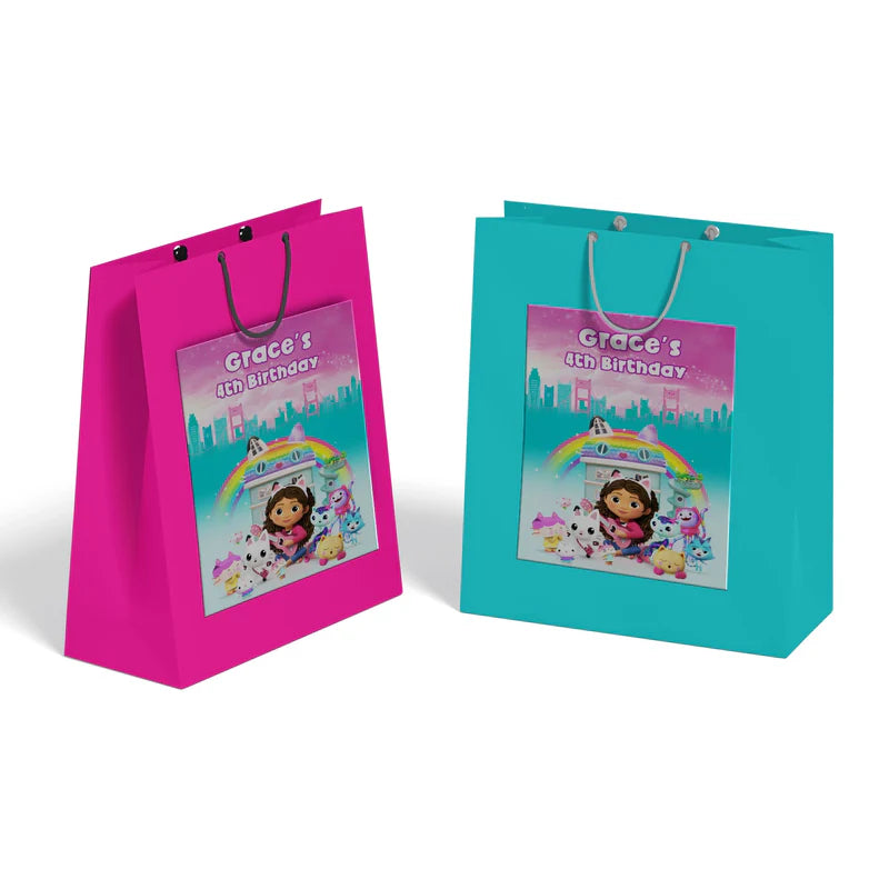 Gabbys Dollhouse goodie bag label with pastel character design rectangular flat lay on white background