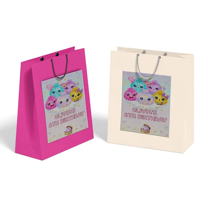 Glitter Dumpling goodie bag label featuring a vibrant party theme design applied to a classic paper gift bag