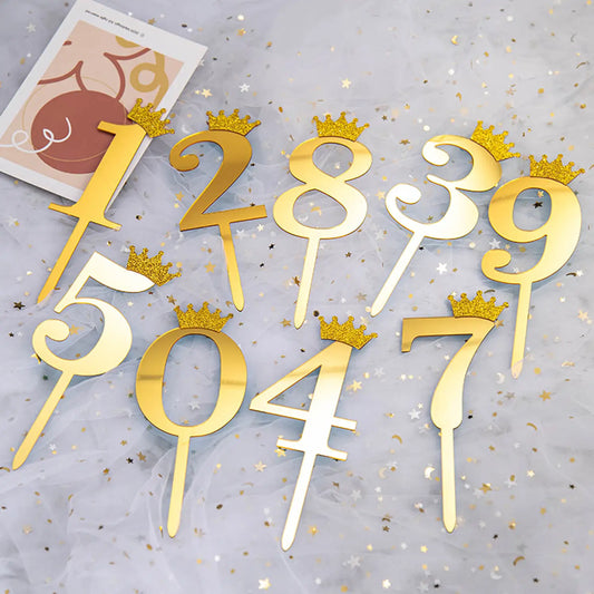 Set of mirrored gold acrylic cupcake toppers featuring numbers 0 through 9 in a modern font.