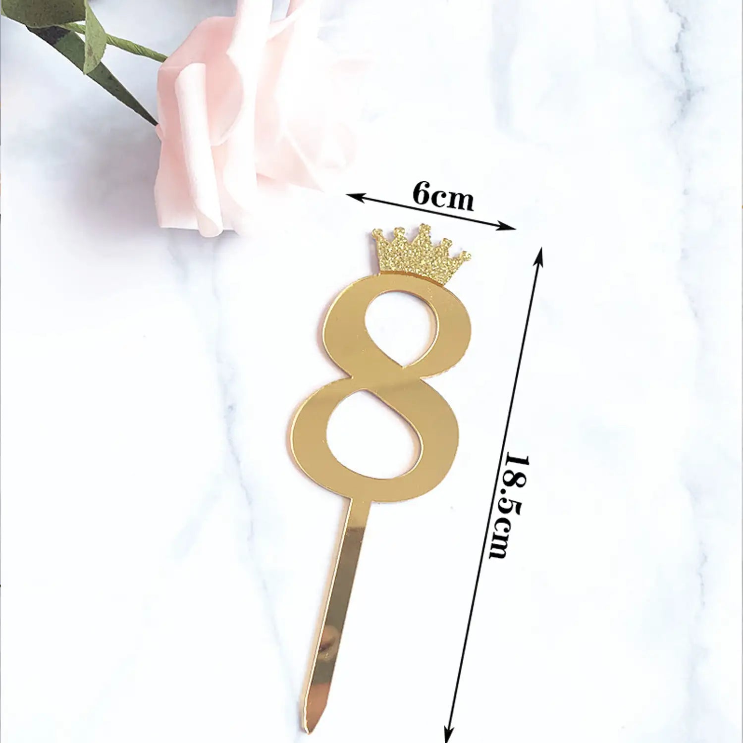 Set of mirrored gold acrylic cupcake toppers featuring numbers 0 through 9 in a modern font.