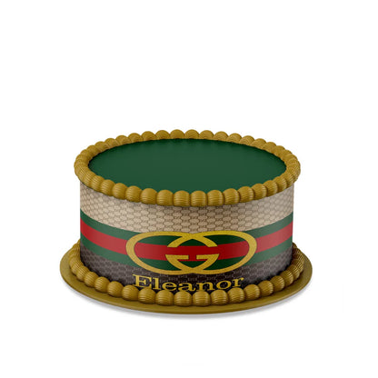Gucci inspired edible cake strips with green red stripe pattern wrapped on white frosted cake
