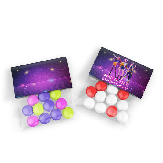 Huntrix Kpop Demon Hunters treat bag topper label with folded design and colorful character artwork