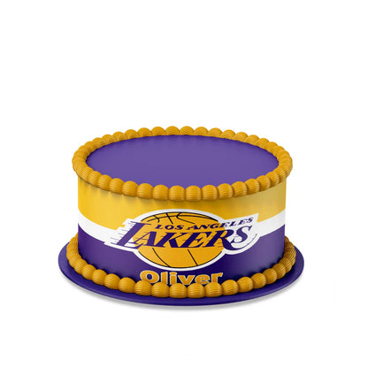 LA Lakers edible cake strips in team colors wrapped around rectangular cake on clean table setting