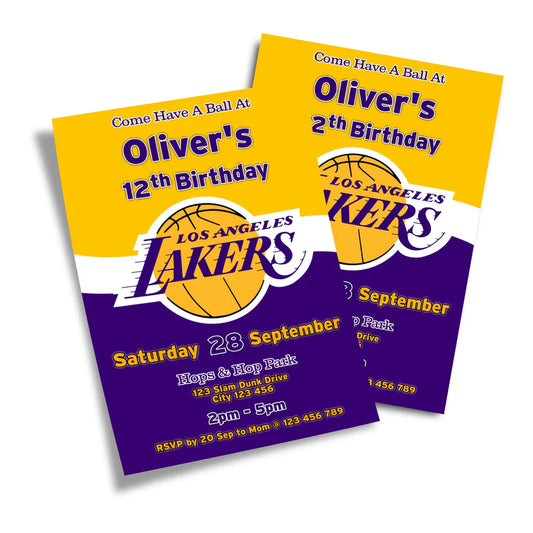 LA Lakers birthday card invitations with purple and gold graphics fanned out on flat surface