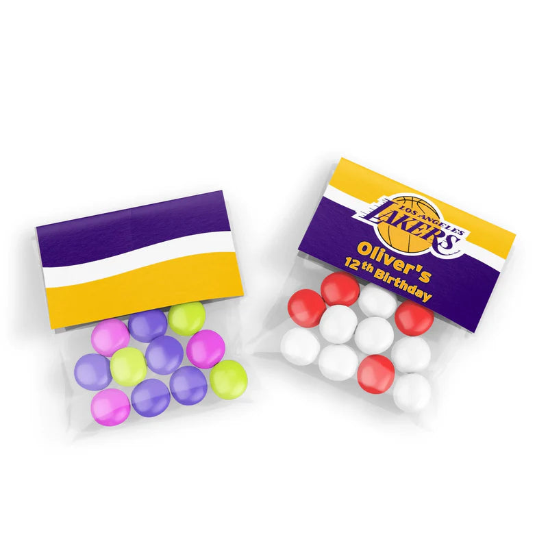 LA Lakers treat bag topper label folded over clear bag filled with snacks on white surface
