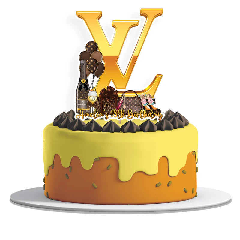 Louis Vuitton inspired cake toppers personalized with gold lettering and brown monogram flat lay