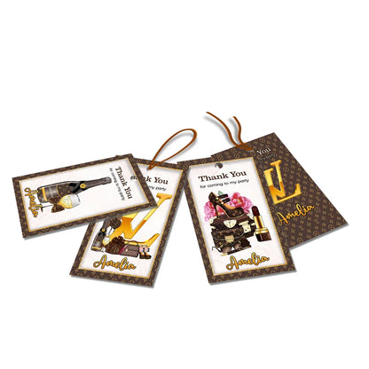 Louis Vuitton inspired thank you tags with brown monogram and gold script text on white surface