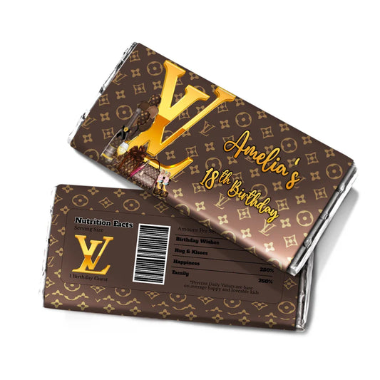Louis Vuitton inspired chocolate label with gold brown designer wrap on candy bar on white background