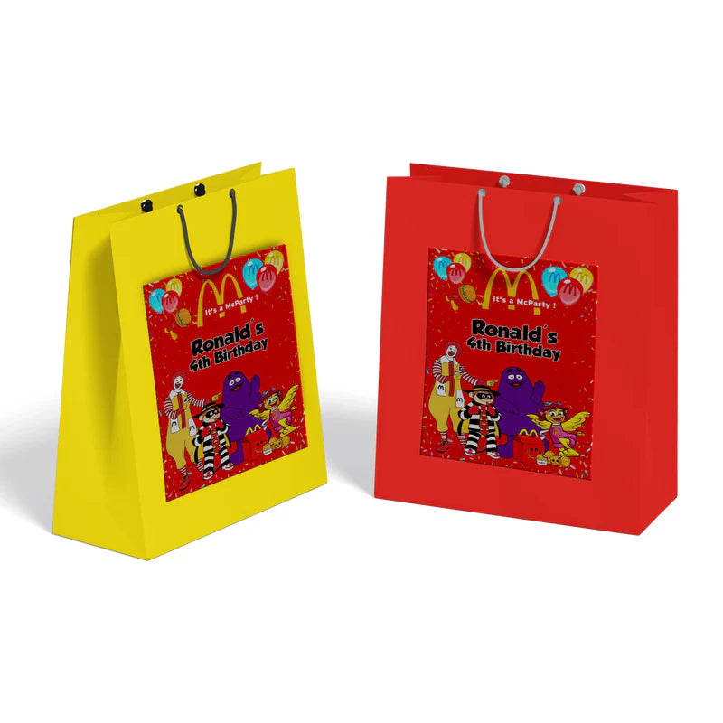 McDonalds goodie bag label with yellow arches and red background sticker on clear treat bag