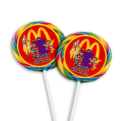 McDonalds lollipop label with red circle sticker featuring logo on clear lollipop stick