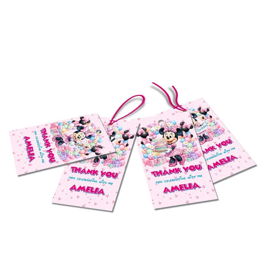 Minnie Mouse thank you tags with colorful text accents displayed on a neatly wrapped party favor box