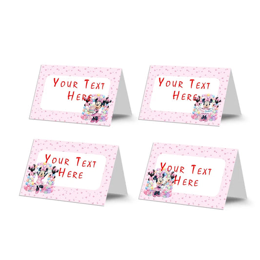 Minnie Mouse food cards showing a collection of vibrant buffet labels arranged on a decorated treat t