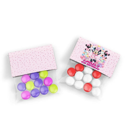 Minnie Mouse treat bag topper label showing a colorful folded paper design sealing a clear candy pouch