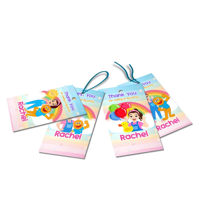 Ms Rachel toddler learning thank you tags with personalized designs and bright accents flat lay
