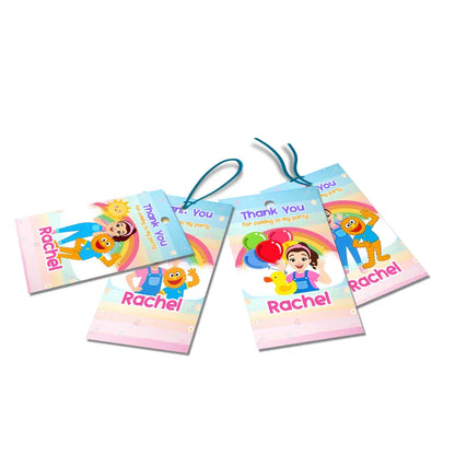 Ms Rachel toddler learning thank you tags with personalized designs and bright accents flat lay