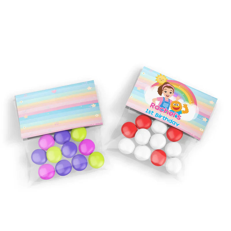 Ms Rachel toddler learning treat bag topper label with bright colors and custom design flat lay