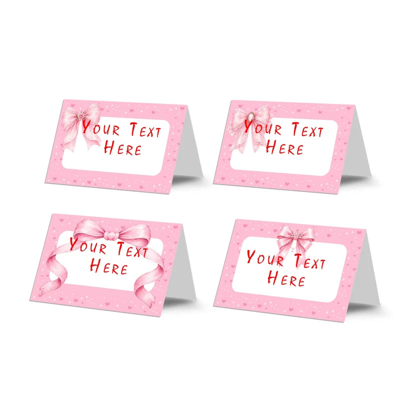 Pink Bow food cards showing a collection of charming buffet labels arranged on a decorated treat t