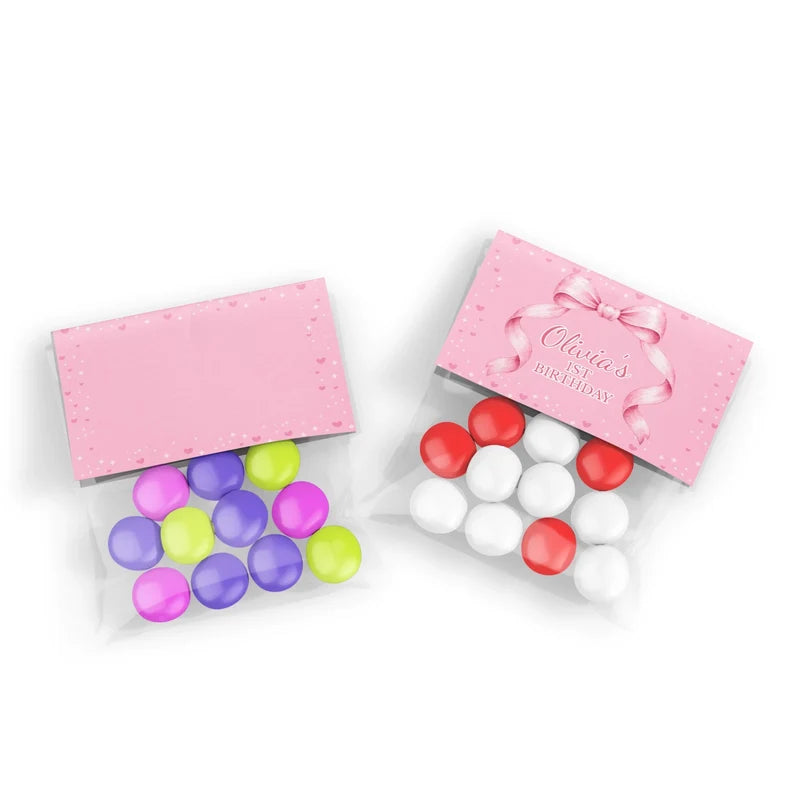 Pink Bow treat bag topper label showing a folded pastel paper design sealing a clear candy pouch