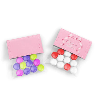 Pink Bow treat bag topper label showing a folded pastel paper design sealing a clear candy pouch