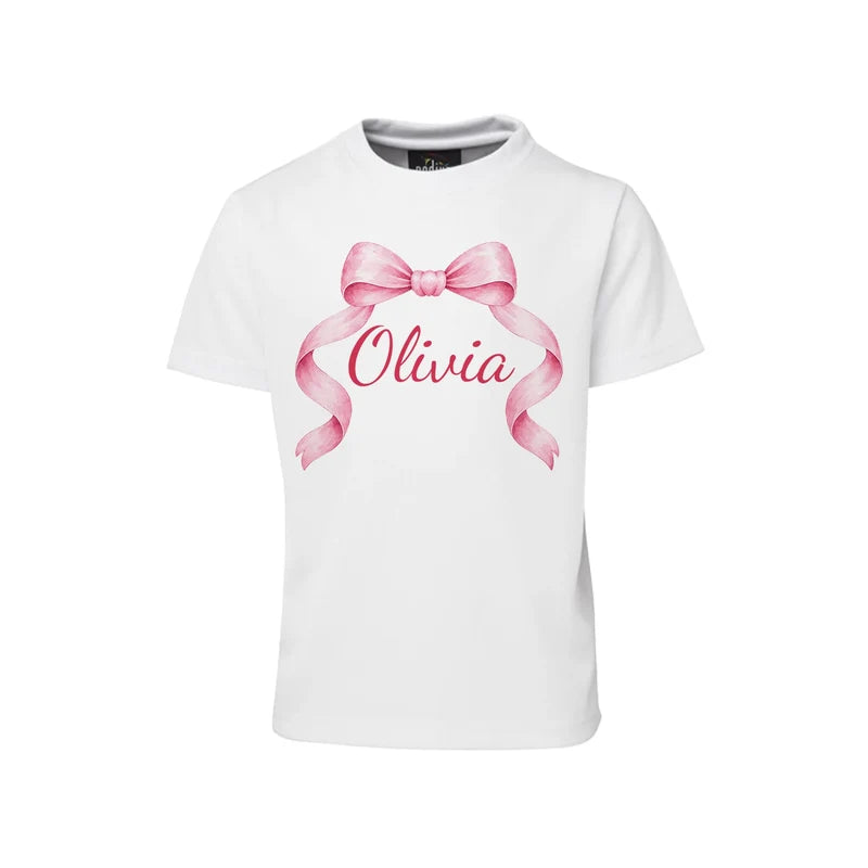 Pink Bow sublimation T-shirt mockup showing a graphic layouted on a white cotton shirt