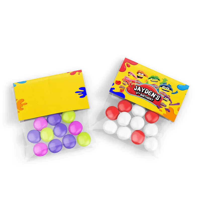 Play Doh treat bag topper label, bright fold-over design, flat lay on white background