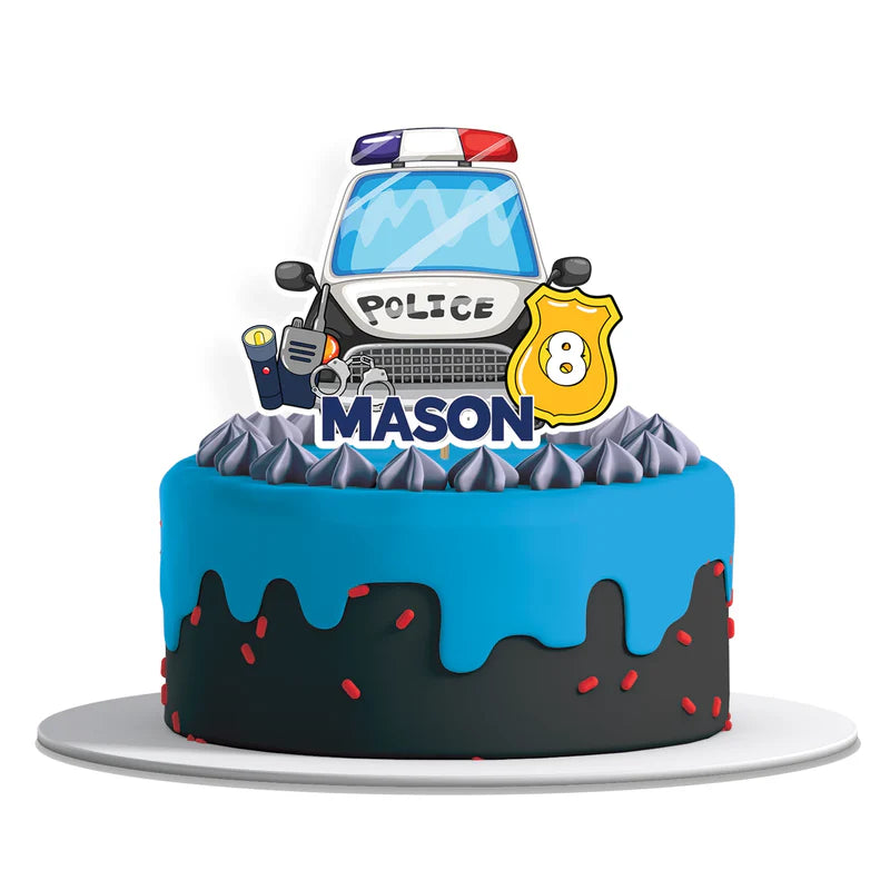 Kids police cake toppers with police car graphics on round cardstock cutouts