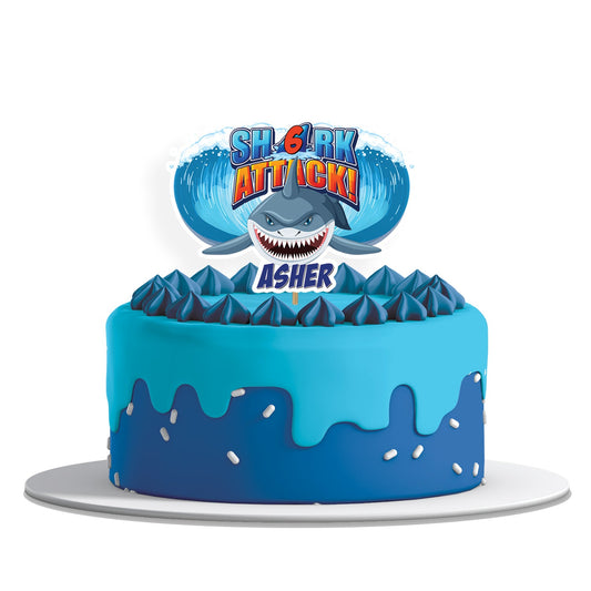 Custom shark-themed cake topper for personalized celebration