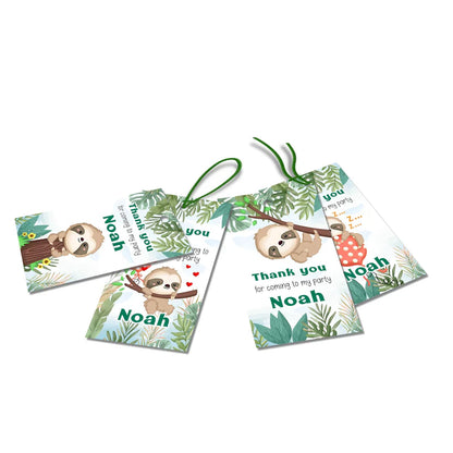Sloth thank you tags with playful cartoon sloth design flat lay on white background